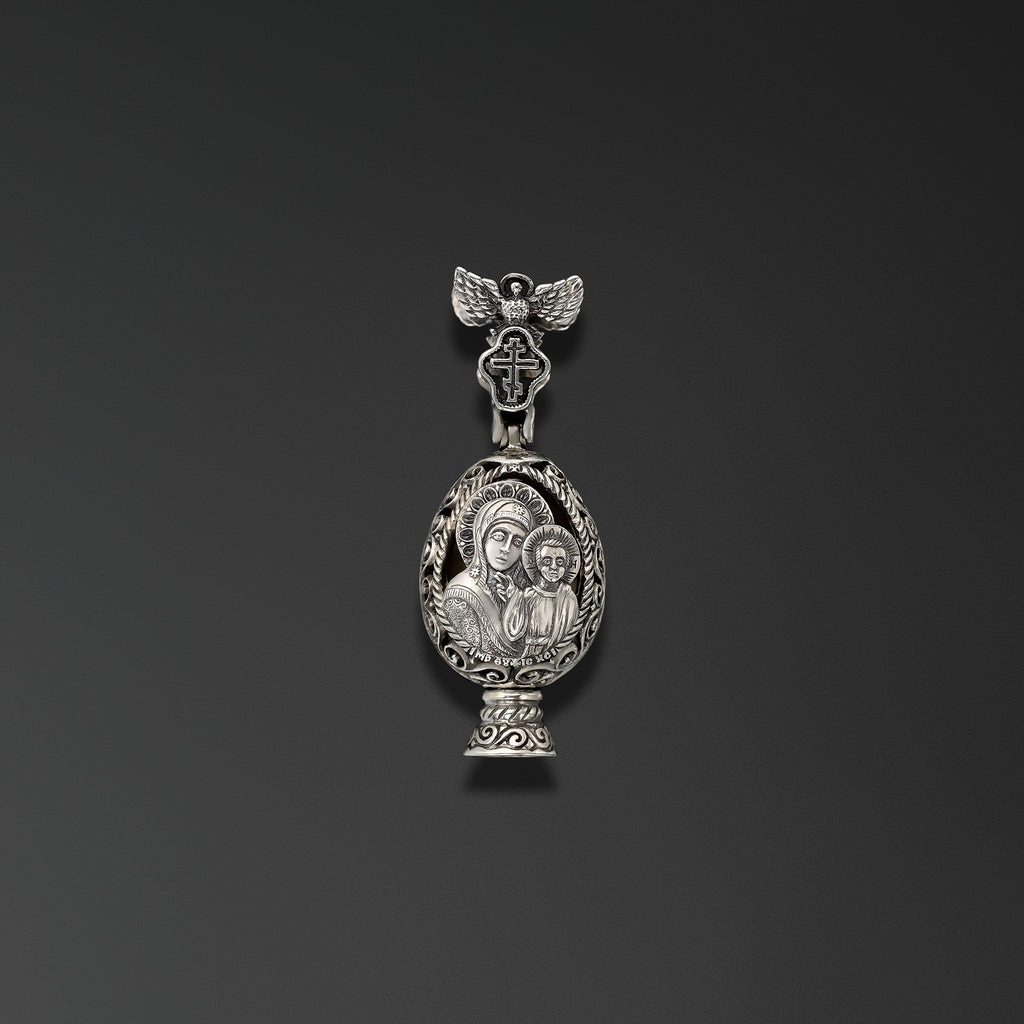 Resurrection. Easter Egg with an Image of Our Lady of Kazan photo a