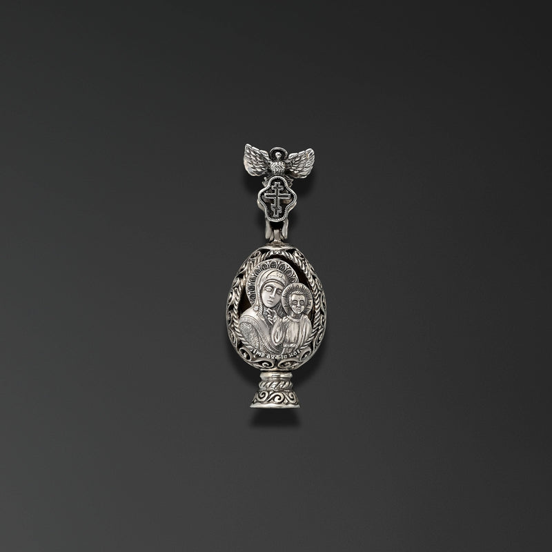 Resurrection. Easter Egg with an Image of Our Lady of Kazan photo a
