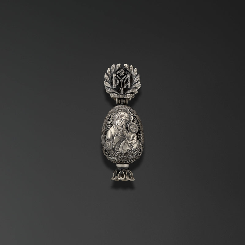 Presentation of Jesus at the Temple. Easter Egg with an Image of the Iveron Theotokos photo a