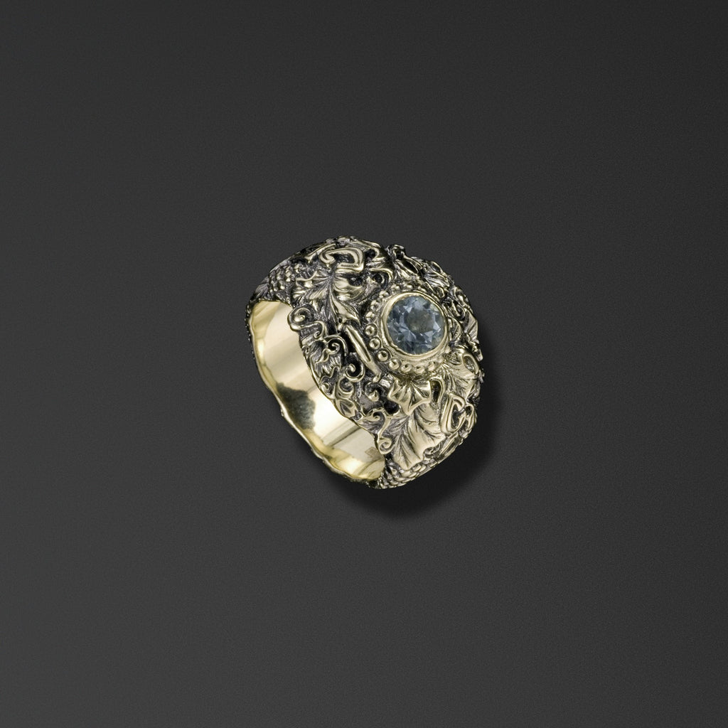 Protective signet ring bearing the words ‘Save and Protect’ with grape vines. photo a
